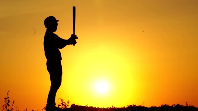 Silhouette-man-with-baseball-bat-to-practice