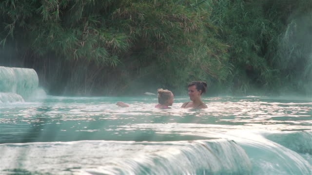 Little-Girl-and-Mother-Relaxing-in-a-Hot-Springs