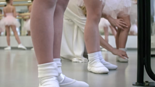 Girls-Training-with-Ballet-Barre