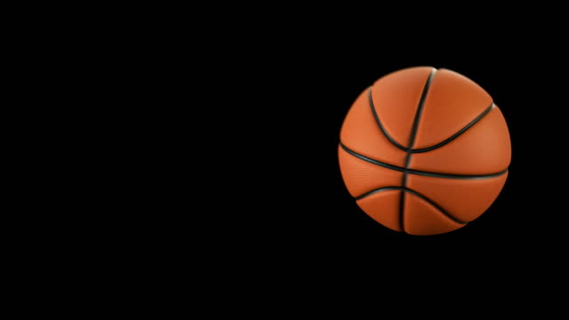 Bola-baloncesto-hermosa-lanza-en-cámara-lenta-en-negro-con-las-llamaradas.-Serie-de-4-Videos.-Baloncesto-animaciones-3d-del-vuelo-de-la-bola.-4-k-Ultra-HD-3840-x-2160.