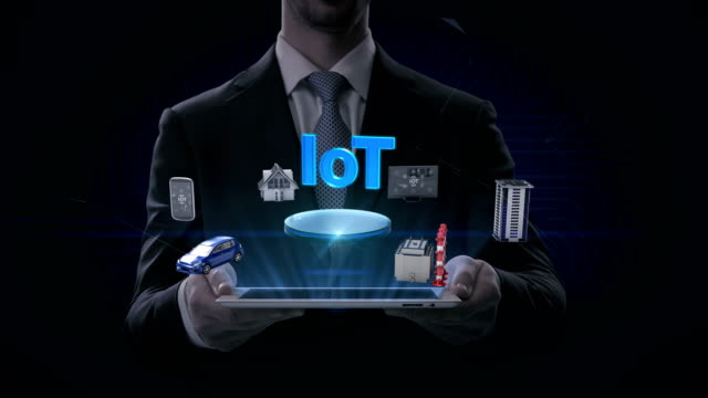 Geschäftsmann-hubkissen-smart,-Smart-House,-Fabrik,-Gebäude,-Auto,-Handy,-Internet-Sensor-anschließen-'IoT'-Internet-der-Dinge.-4-k-Film.