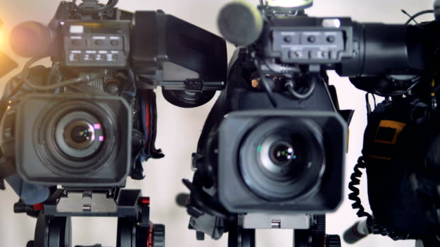 Close-view-on-three-different-cameras-in-a-row.