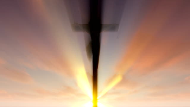 Jesus-cross-against-beautiful-sunrise,-4K