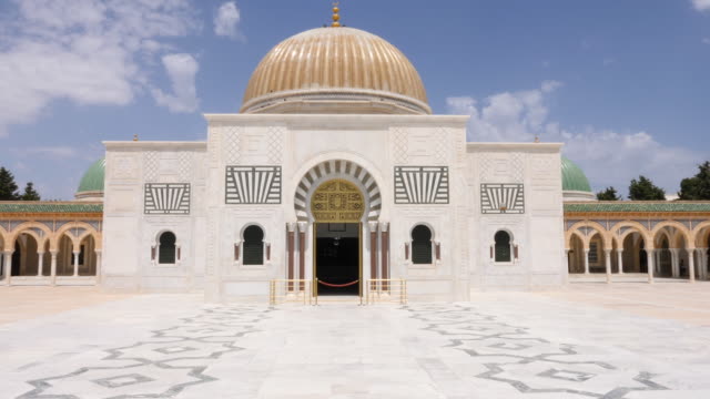 Doors-main-entrance-to-mausoleum-president-Habib-Bourguiba-Monastir-city-Tunisia.-Track-in-camera-shot