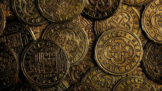 Closeup-de-monedas-de-oro-históricas