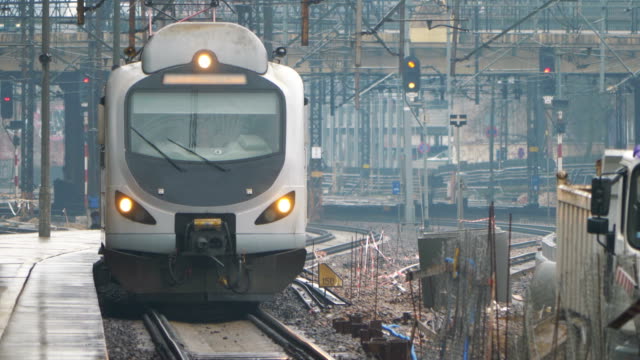 Train-entering-train-station-in-4K-slow-motion-60fps