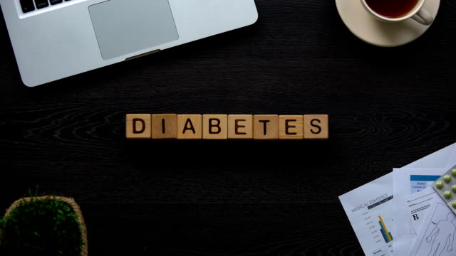 Diabetes-Wort-gebildet-Würfel,-hohen-Blutzuckerspiegel,-Stoffwechselstörung,-Gesundheit