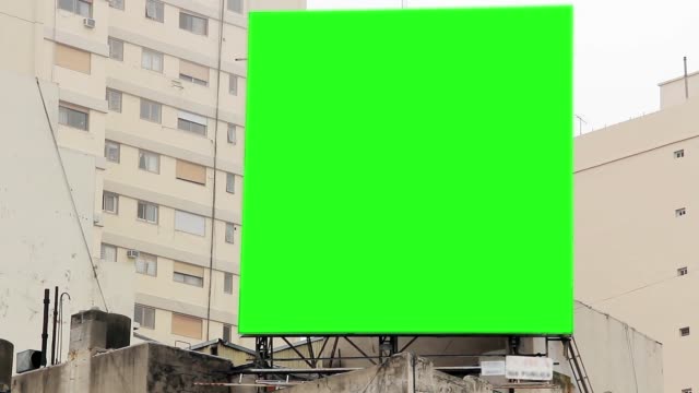 Billboard-with-Green-Screen-on-a-Building.