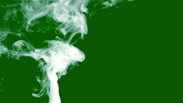 slow-motion-of-smoke-or-steam-on-a-green-isolated-screen