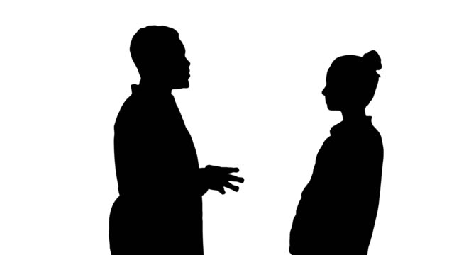 Silhouette-Male-african-doctor-talking-to-female-patient