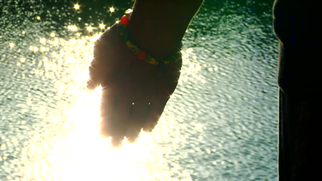 Close-Up-of-Shaman's-Hand-at-the-Water-Meditation-Ceremony