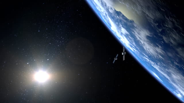 Dos-satélites-de-exploración-y-seguimiento-de-la-tierra.-Los-satélites-está-volando-desde-lejos-y-desaparece-de-la-cámara.-4K.