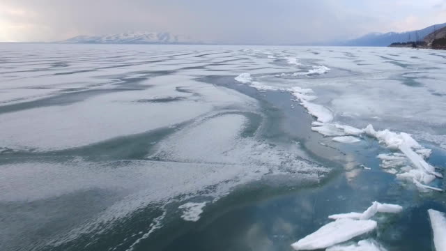 Flying-over-iced-sea-or-ocean-by-helicopter-.
