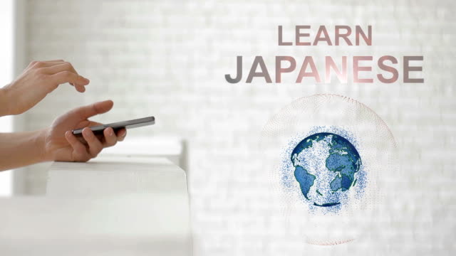 Hände-zu-starten,-die-Erde-Hologramm-und-japanischem-Text-lernen