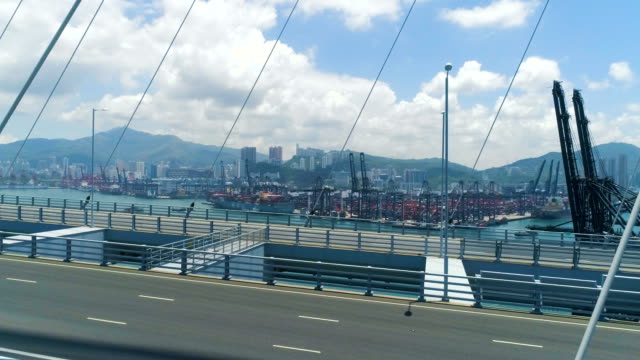 View-of-Hong-Kong-Kwai-Tsing-Container-Terminal-through-Stonecutter-bridge.-Aerial-drone-shot