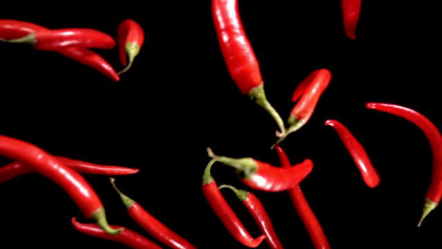 Falling-of-red-pepper.-Slow-motion-480-fps