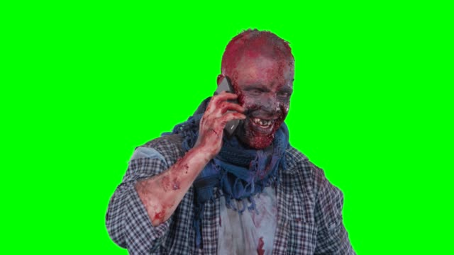Male-zombie-using-cell-phone-calling-someone