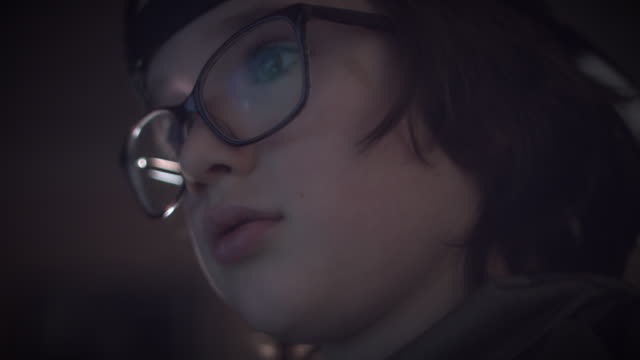 4K-Close-up-Child-with-Glasses-Playing-Video-Game