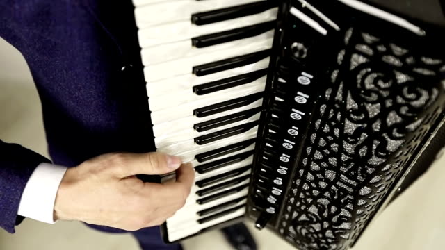 The-accordionist-plays-a-sensual-piece-on-an-expensive-accordion.
