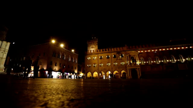 People-go-through-an-old-night-city,-Europe,-Prague,-time-lapse