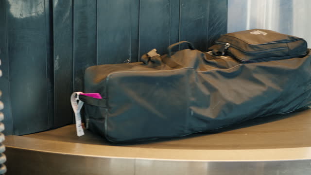 Luggage-of-passengers-is-moved-along-the-transport-belt