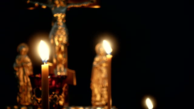 burning-candles-on-a-candlestick-at-the-empty-orthodox-church