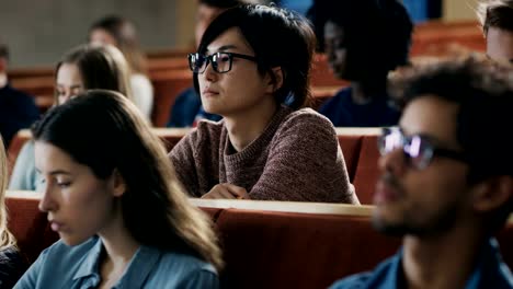 Large-Group-of-Multi-Ethnic-Students-Listening-to-a-Lecture-in-the-Classroom.-Bright-Young-People-Study-at-University.