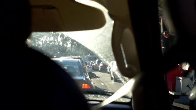 Car-stuck-in-traffic-jam-in-California-in-slow-motion