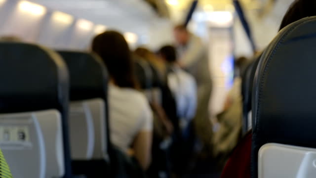 Passagiere-im-Flugzeug