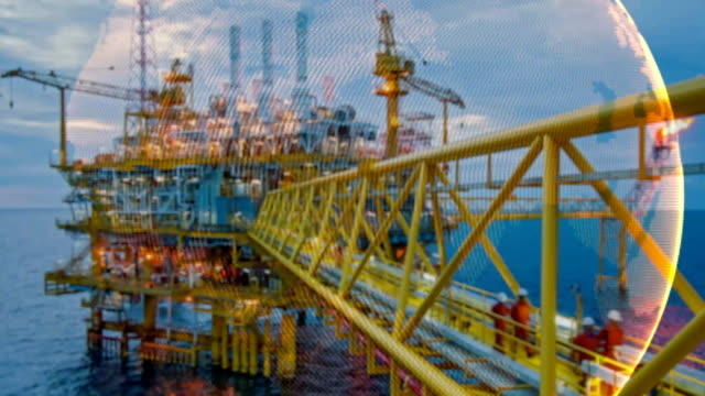 Offshore-rig-blur-background-with-revolving-earth-graphic-motion