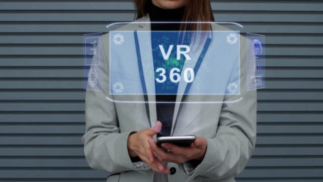 Business-woman-interacts-HUD-hologram-VR-360