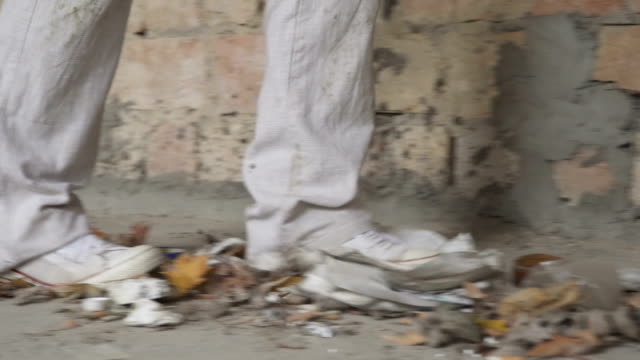 Homeless-walks-on-the-trash