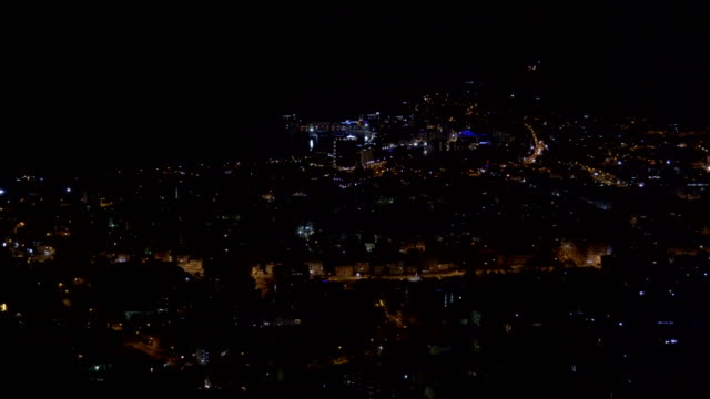 Panoramic-shot-of-The-City-of-Budva-at-night