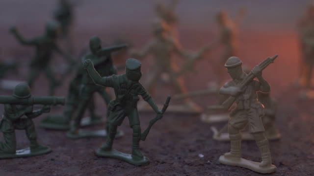 toy-model-soldier-in-the-fire.-The-concept-of-the-death-of-war.-slow-motion