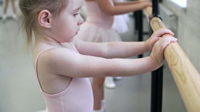 Diligent-Little-Ballerinas-Doing-Plie