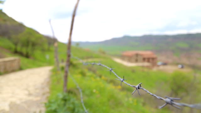 Fence-with-barbed-wire