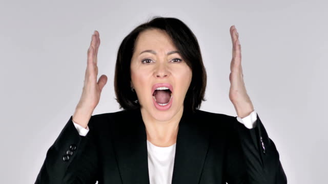 Portrait-of-Screaming-Businesswoman-going-Crazy