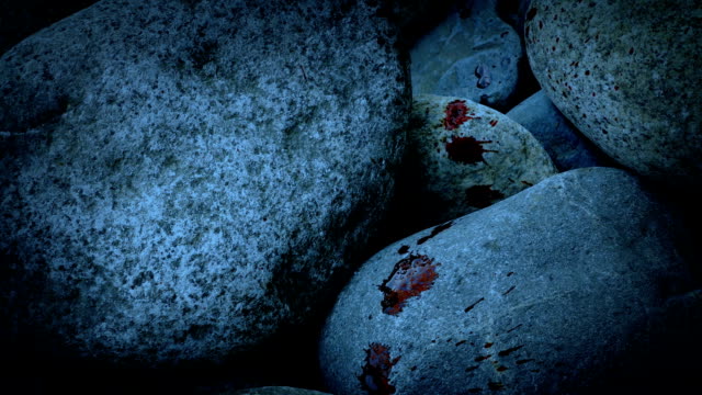 Blood-Spatters-On-Rocks-In-The-Evening