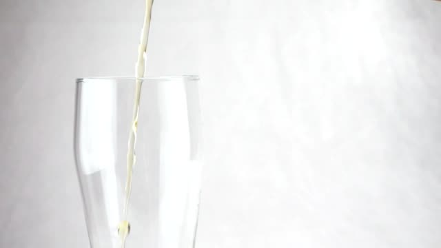 In-an-empty-beer-glass-pour-beer-in-slow-motion