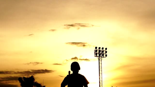 Silhouette-baseball-players-were-practicing-in-the-evening