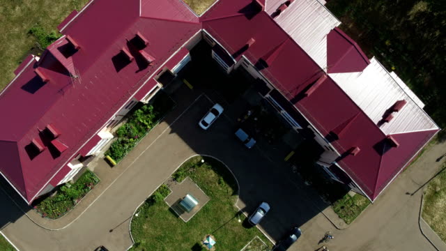 Aerial-View-Yard-between-Red-Roofs-Houses