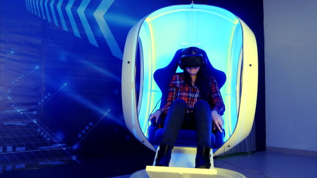 Young-girl-sitting-in-virtual-reality-attraction-and-feeling-scary