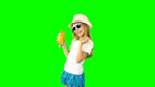 Young-caucasian-girl-walking-and-drinking-orange-juice.-Thumbs-up-gestures-show.
