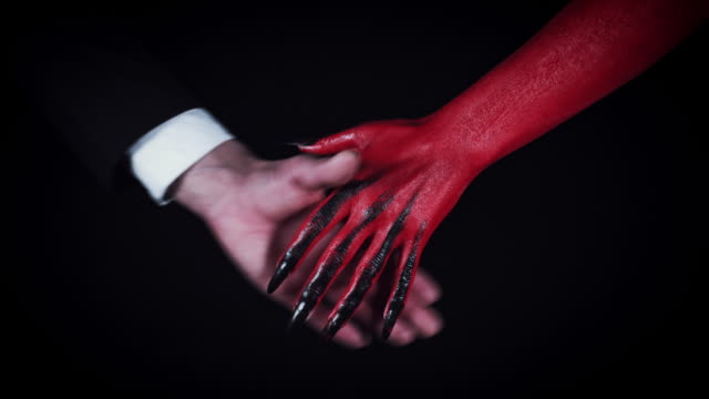 4k-Horror-Devil-Shaking-Hand-with-Businessman