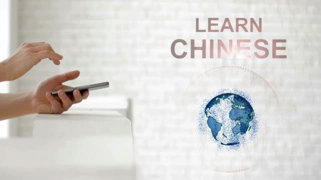 Hände-zu-starten,-die-Erde-Hologramm-und-Learn-Chinese-text