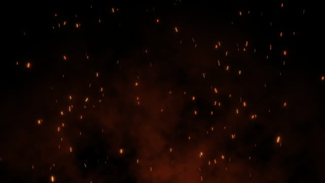 Schuss-des-Fliegens-Feuer-Funken-in-der-Luft-auf-dunklen-schwarzen-Hintergrund