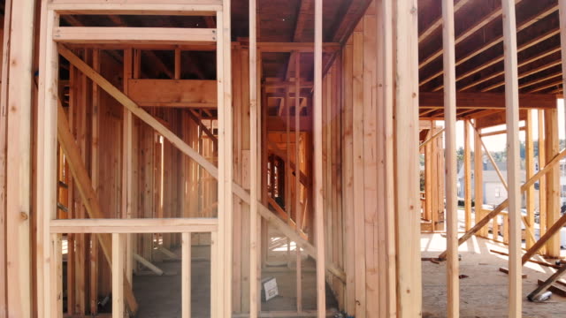 Building-construction,-wood-framing-and-beam-construction-structure-at-new-property-development
