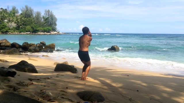 White-man-alone-doing-eastern-healing-physical-practice-Chinese-chi-kung