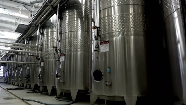 Steel-barrels-for-fermentation-of-wine-in-winemaker-factory