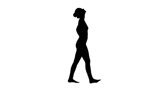 Silhouette-Beautiful-young-woman-stretching-her-neck-walking